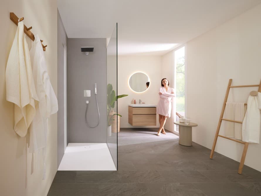 Woman in bathroom with shower