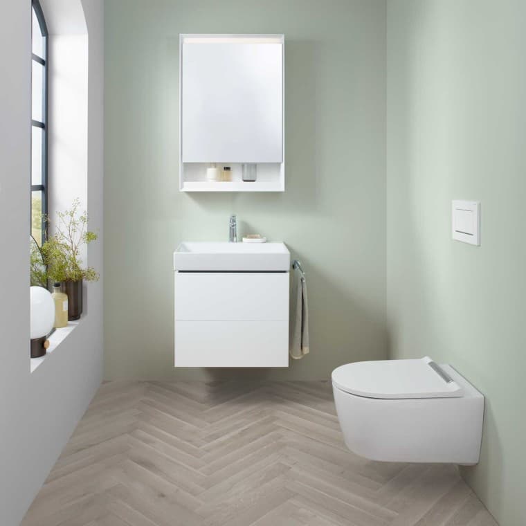 Geberit ONE washbasin area with small handrinse basin, washbasin cabinet and mirror cabinet, plus a shower toilet. Geberit ONE washbasin area with small handrinse basin, washbasin cabinet and mirror cabinet, plus a shower toilet.